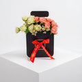 Flowers In Black Box
